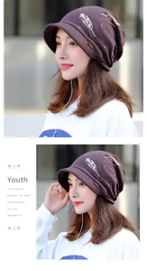 Detail view of women's autumn winter soft brim beanie hat with elegant feather print