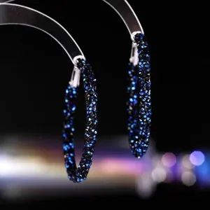 Elegant Klein blue and black rhinestone encrusted hoop earrings with luxury crystals