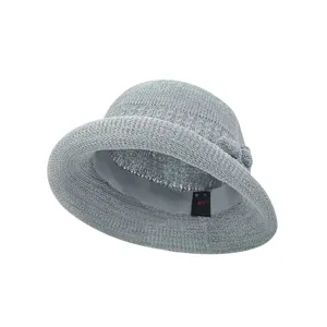 Elegant grey knitted bucket hat with a stylish side bow for women's autumn fashion.