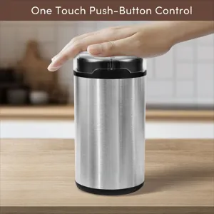 Close-up of electric coffee grinder with one touch push-button control operation