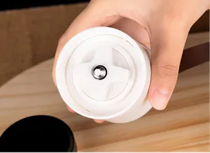 Close-up detail of the manual pill grinder internal mechanism and grinding core