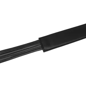 Detail view of stylish black tassel leather belt for women's dress accessory