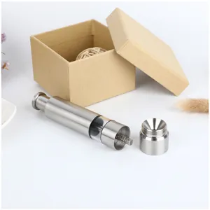 Manual stainless steel pepper grinder with press mechanism and storage box