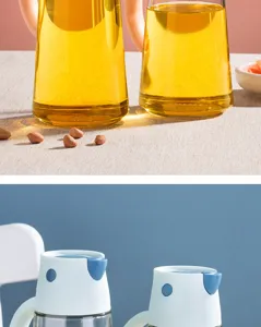 Detail view of automatic opening glass oil dispenser for kitchen storage