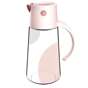 Elegant pink automatic opening glass oil dispenser bottle with an ergonomic handle