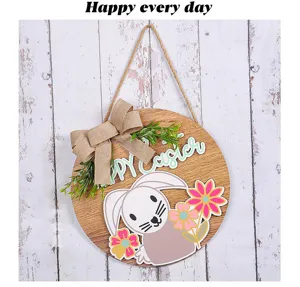 Decorative Easter bunny wooden door sign with burlap bow and Happy Easter text