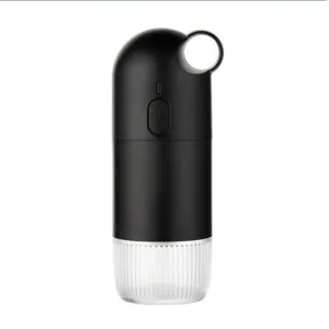 Minimalistische tragbare elektrische Kaffeemühle mit schwarzem Matt-Finish und Glasbecher