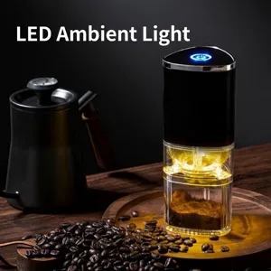 Portable electric coffee grinder featuring LED atmospheric light and transparent bean chamber
