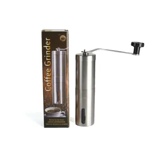 Molinillo de café manual de acero inoxidable portátil con caja de venta.