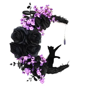Gothic moon cat wreath with black roses and crystal pendant for Halloween decor details.