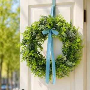 Artificial green leaf wreath with light blue velvet ribbon for spring home decor