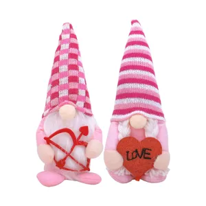 Adorable pair of Valentine's Day plush gnomes featuring Cupid bow and glittery love heart