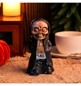 Close-up of a standing resin skeleton reaper figurine for Halloween home table decor