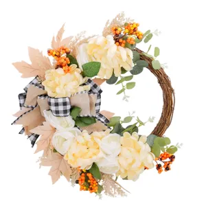 Artificial autumn floral wreath with mixed flowers, berries and plaid bow for door decor.