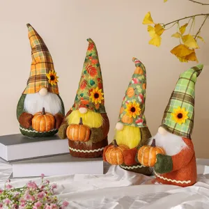 Set of four autumn fall gnomes with sunflowers and pumpkins holiday decorations