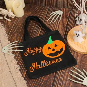 Zwarte Halloween non-woven tas met pompoenprint voor snoep en cadeautjes opbergen.