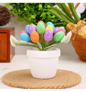 Close-up of a 12cm colorful glittery Easter egg potted plant for festive home decor