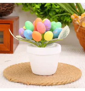 Detailed view of colorful speckled Easter egg potted plant on a rustic jute mat