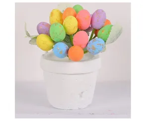 Detailed view of colorful speckled Easter egg potted plant decoration for garden