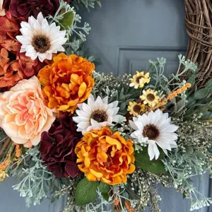 Autumn wreath with faux sunflowers and roses for front door holiday decoration