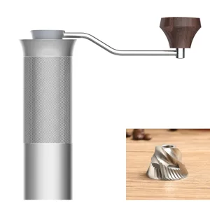 Detail of manual coffee grinder with CNC stainless steel burr and wooden handle