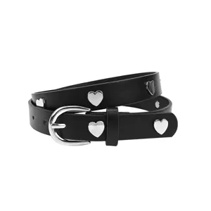 Black minimalist faux leather belt for women featuring silver heart-shaped metal studs