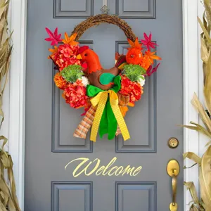 Festive Thanksgiving chicken wreath with colorful hydrangeas and maple leaves on a grey door