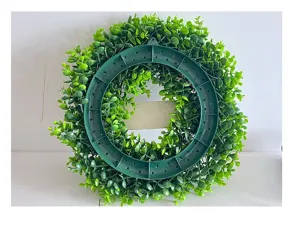 Rear view detail of green eucalyptus wreath with blank central sign for custom DIY door decor