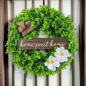 Decorative artificial green eucalyptus wreath with home sweet home sign and white flowers