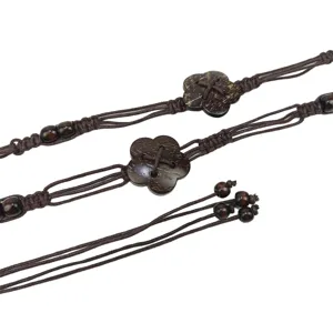 Bohemian woven waist chain featuring coconut shell flower and dark wood beads decoration