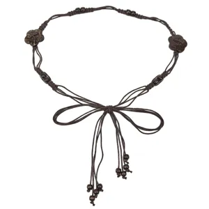 Bohemian style braided waist chain belt with dark brown flower beads and tassel details