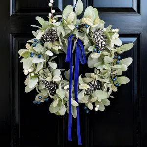 Artificial lamb's ear wreath with frosted pine cones, blue berries and velvet ribbon
