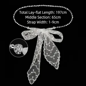 Elegant white lace tie-up belt with silver bead chain and decorative bow for dresses