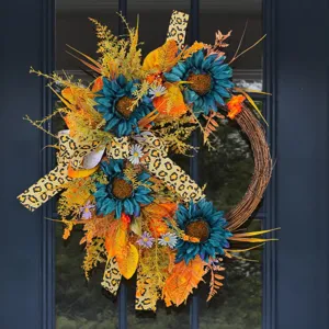 Ghirlanda autunnale con girasoli blu e nastri leopardati per porta d'ingresso