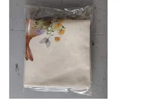 Detailed view of an Easter rabbit throw pillowcase in transparent plastic packaging