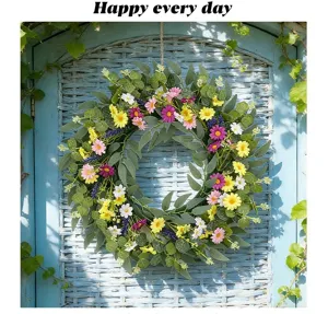 Vue détaillée d'une couronne de fleurs sauvages de printemps sur une porte en osier