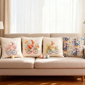 Set of four Easter bunny throw pillow covers displayed on a beige sofa in a sunlit room