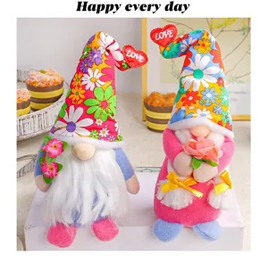 Two colorful plush floral gnomes with LOVE heart hats for Harvest Festival party decor