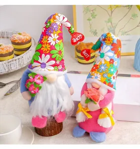 Detailed shot of two festive sunflower gnome dolls for holiday home decoration