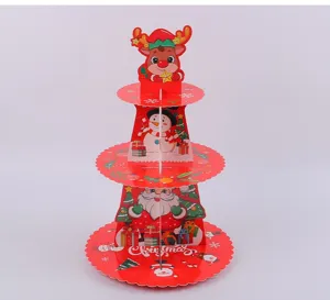 3-tier Christmas cardboard cupcake stand with Santa and snowman designs for parties.
