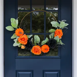 Halloween hoop wreath with orange pumpkins and roses for front door decor
