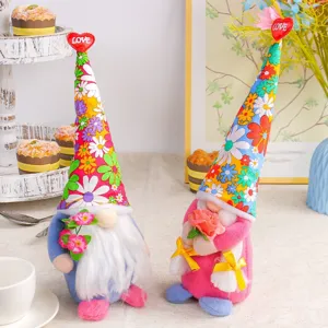 Pair of colorful floral hat gnomes with LOVE hearts for Thanksgiving holiday party decor
