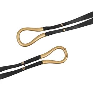 Stylish women's wide belt with matte gold horseshoe buckle and black leather strap