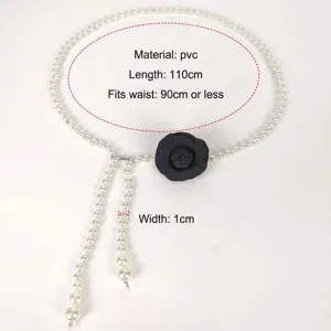 Detail view of pearl waist chain with black camellia flower and size measurements