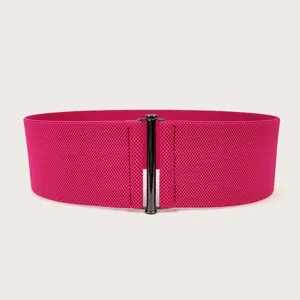 Vibrant fuchsia wide elastic waist belt for women with elegant metal buckle closure