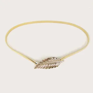 Elegant gold metal spring belt for women featuring a stylish leaf shaped buckle design