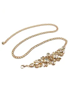 Close-up detail of women's gold chain belt with sparkling rhinestone flower embellishment