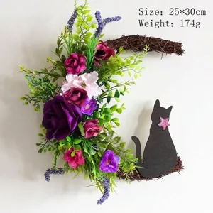 Halloween moon wreath with cat silhouette, purple roses and rustic vine twig base.