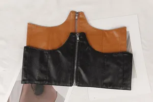 Detailed view of brown and black wide waist seal belts with fishbone zipper design
