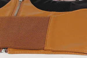 Macro detail of brown leather and elastic texture on wide corset belt with zipper